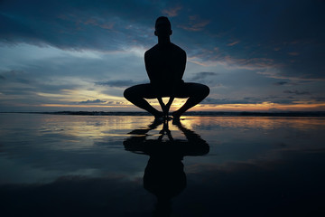 meditation and yoga on the beach / summer vacation concept health beauty, summer vacation yoga classes on the sea shore