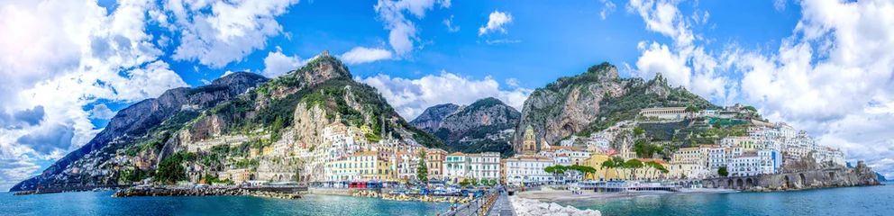 Fotobehang Panoramic view of the town of Amalfi on coast in Italy © Flaviu Boerescu