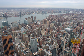 Fototapeta na wymiar Aerial view of Manhattan in New York City showing the classic high rise buildings and city scape in the USA