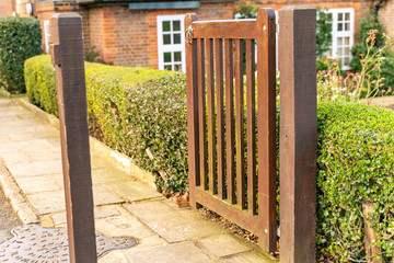 The garden pedestrian gate and exterior of a typical English residential old London town house
