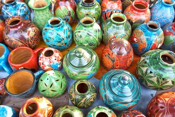 Assortment of Traditional Costa Rica Porcelain Pottery and Crafts sold as Colorful Tourist Souvenirs in outdoor market near the Entrance to Manuel Antonio National Park