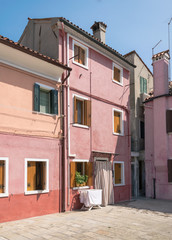 Fototapeta na wymiar Typical southern Italian house painted in pink.