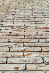 red brick wall texture grunge background with vignetted corners, may use to interior design