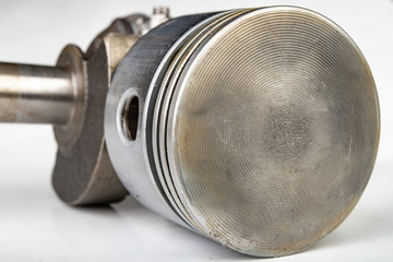 Piston and connecting rod of a small combustion engine. Components needed for mounting a high-power generator.