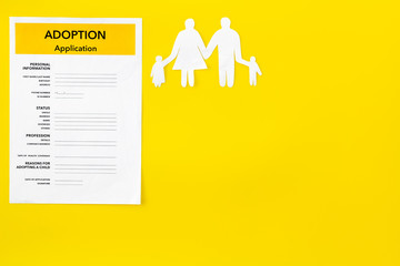 Family and adoption child concept with application on yellow background top view mockup