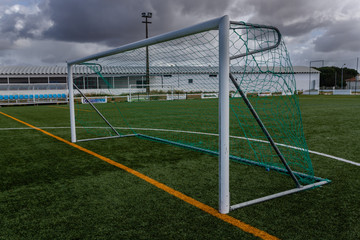 Empty Soccer Goal and a Beautiful clouded sky.