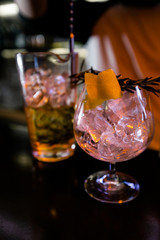 Cocktails by a barmen in a nightclub - Bartender skills are shown