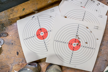 Shooting targets lying on a bench