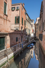 Italy,canal of Venice with boats ,march, 2019
