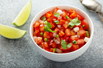 Homemade pico de gallo with tomatoes, peppers, jalapenos and red onions