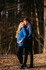 Beautiful portrait of a pregnant woman and her husband.