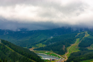 Beautiful Carpathian mountain forest lake after the rain