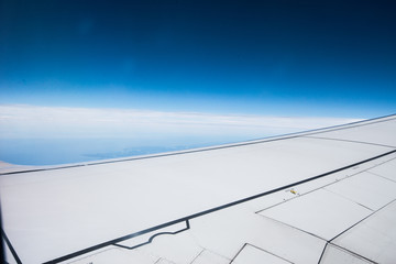 View of the right wing of an airplane.