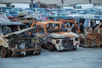 An abandoned, stolen burnt out car