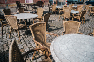 View of empty outdoor cafe in Bad Bentheim, Germany, with cozy decorations