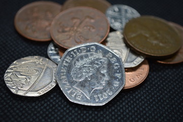 coins on black background