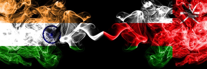 India vs Oman, Omani smoke flags placed side by side. Thick colored silky smoke flags of Indian and Oman, Omani