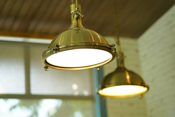 Beautiful modern luxury interior hanging lamp decoration growing in the dining room.