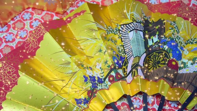 正月イメージ　屏風と扇子に舞い散る金箔