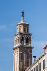 Fototapeta na wymiar The Bell Tower of the Church of Carmini in Dorsoduro Venice,Italy ,march, 2019