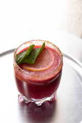 Fresh, Fancy and Healthy Pomegranate (Detox) Smoothie Juice in Glass. Summer Milkshake Drink - Styled Food and Drink Photography (Mint Leaf Garnish, Lemon Slice, Strawberry, Berries and Fruit)