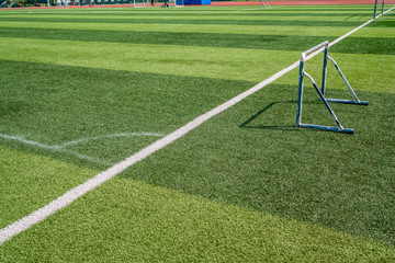 Fototapeta premium beautiful pattern of fresh green grass for football sport, football field, soccer field, team sport texture