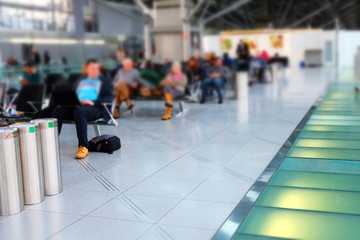 Blurred people waiting for departure