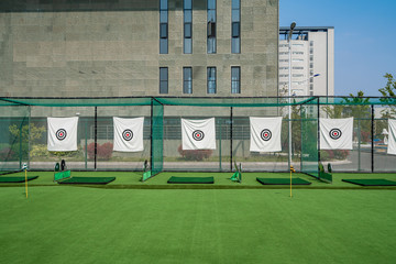 Obraz premium archery target rings during an archery competition. Green grass