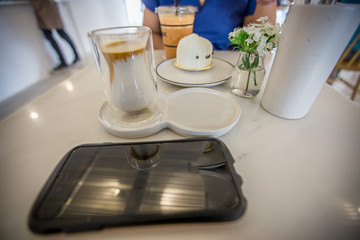 The background of food or drinks placed on the table, blurred from the light and the movement of eating, delicious taste