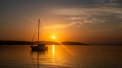 Sunrise Boat on the Lake