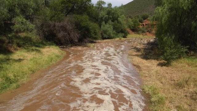 4K view of flooding after heavy rain causes soil erosion