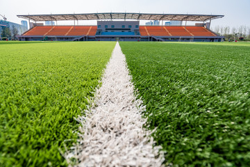 beautiful pattern of fresh green grass for football sport, football field, soccer field, team sport texture