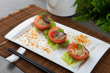 chinese crab meat salad with shark fin and roe inside tomato