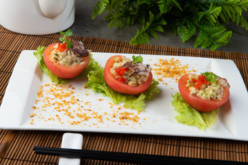 chinese crab meat salad with shark fin and roe inside tomato