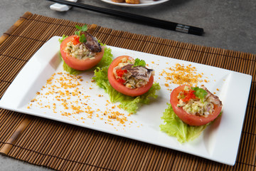 chinese crab meat salad with shark fin and roe inside tomato