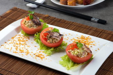 chinese crab meat salad with shark fin and roe inside tomato