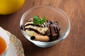 vanilla and chocolate ice cream served with tea
