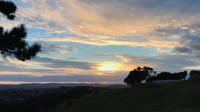 Auckland sunset time lapse on a cloudy evening