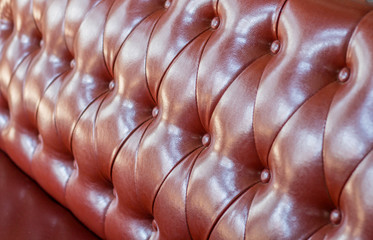 Brown leather skin sofa texture background. 