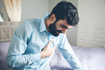Obraz premium man ache heart in room
