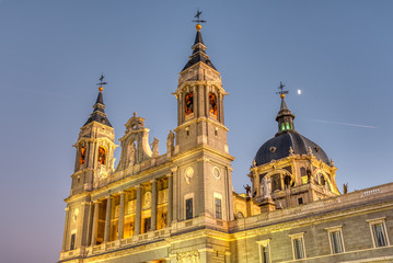 Fototapeta na wymiar The famous Almudena cathedral of Madrid at twilight