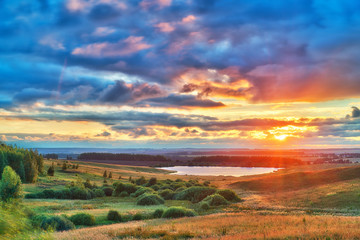 Rural summer landscape at sunset