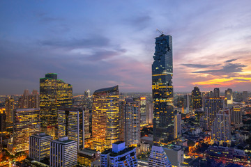 Bangkok City - Aerial view  beautiful sunset  Bangkok city downtown skyline of Thailand , Cityscape tower at night  , landscape Bangkok Thailand