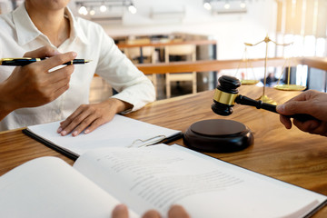 Judge or lawyer talking  with team or client