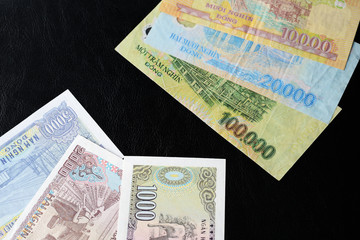 Vietnamese dong bills on a dark background close up. Money background
