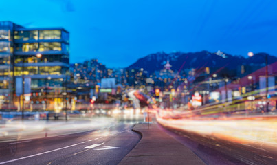 Obraz premium light trails go out of the downtown vancouver