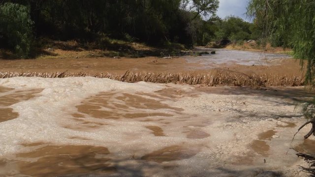 4K view of flooding after heavy rain causes soil erosion