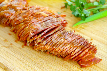 Chinese food sliced beef with tendon on a wood cutting board
