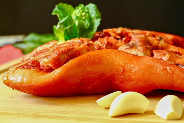 Chinese food pork stew on a wood cutting board Pig head meat