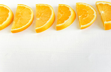Fresh orange sliced. Background for the profile, design, printing with fruit. The basis for the banner with orange. Fresh and natkralnye vitamins. Healthy food. Flat lay, top view.